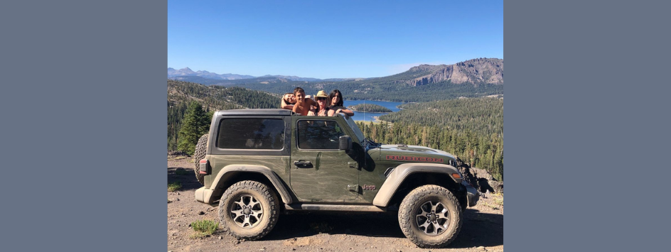 Friends in a Jeep in Sierras